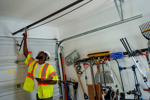 Professional Garage Door Panel Replacement technician working in Oakdale, MN